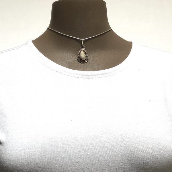 Elk ivory pendant photo