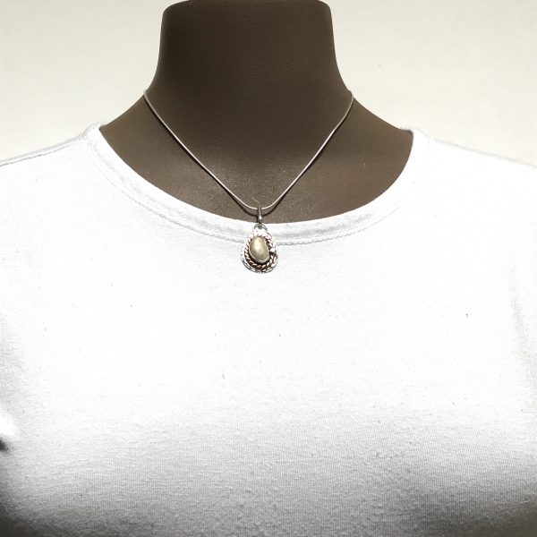 Elk ivory pendant photo