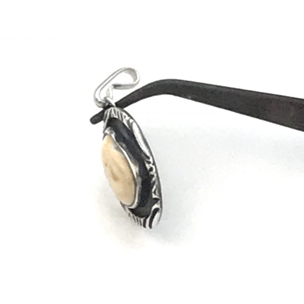 elk ivory pendant photo